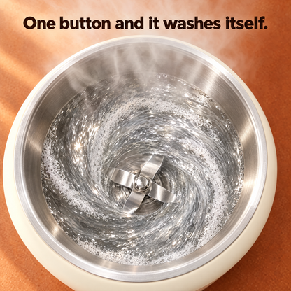 Overhead view of the self-cleaning cycle - hot water swirling inside the stainless steel jar